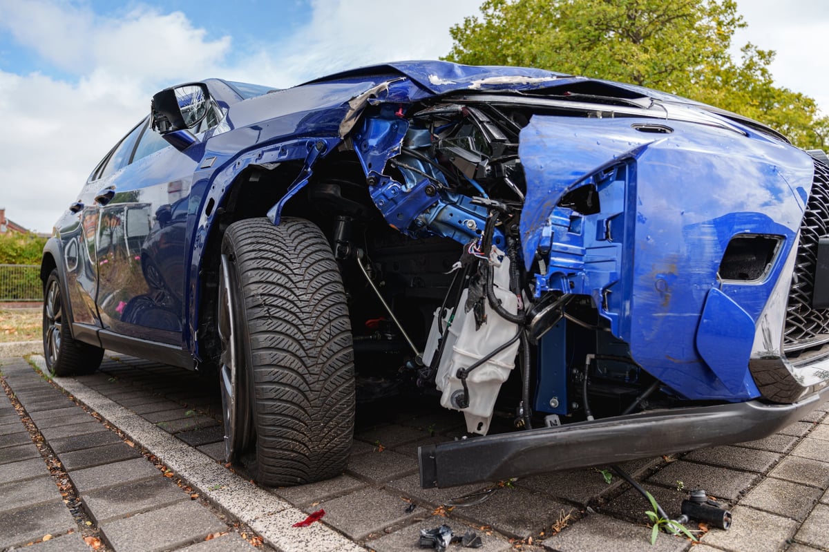 Damaged car front end after a collision